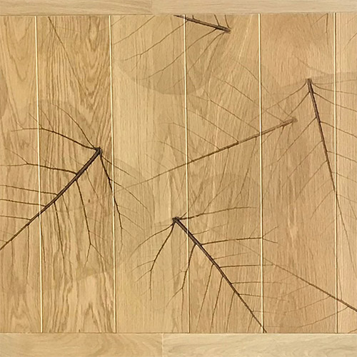 Impression de motifs sur parquet bois